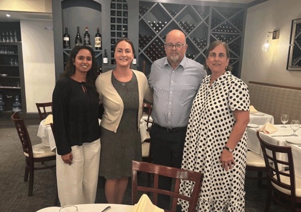 Amy Erickson and Maheen Khan with Energy Tax Savers team