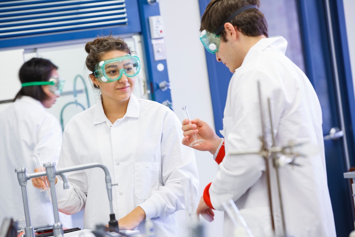 Two people in lab coats