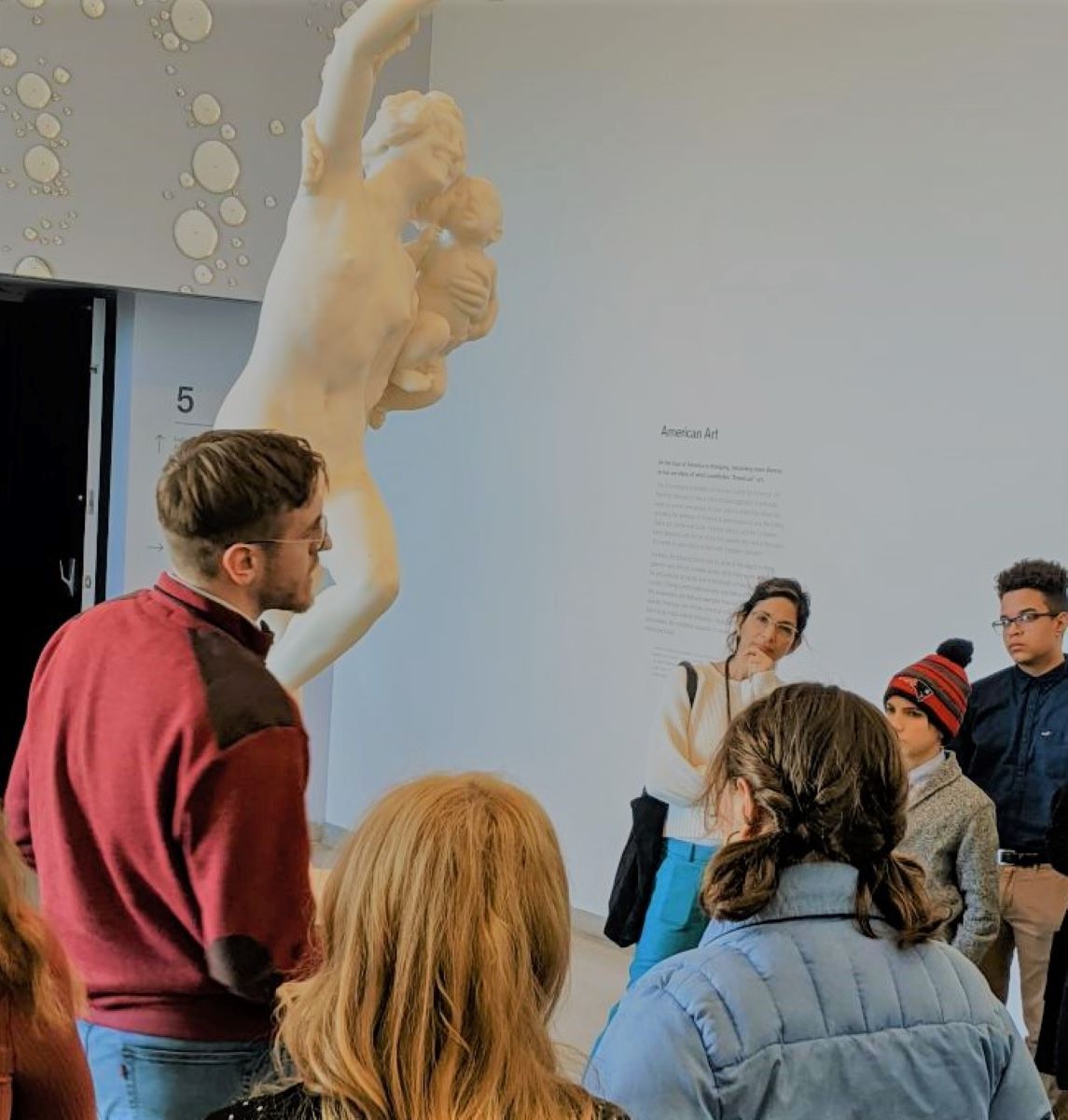 Matthew guiding a school group at The Brooklyn Museum.