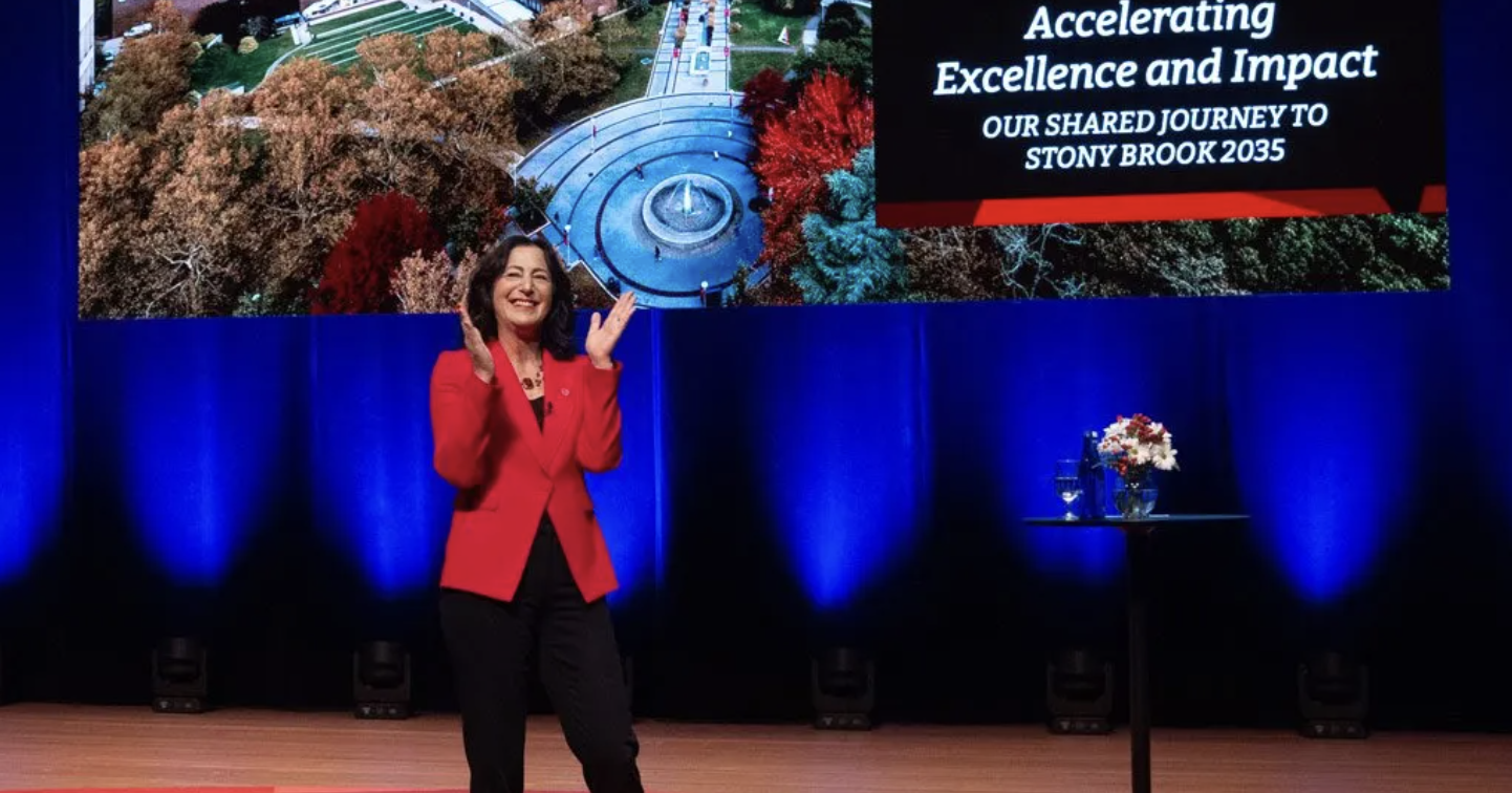 President Andrea Goldsmith on stage
