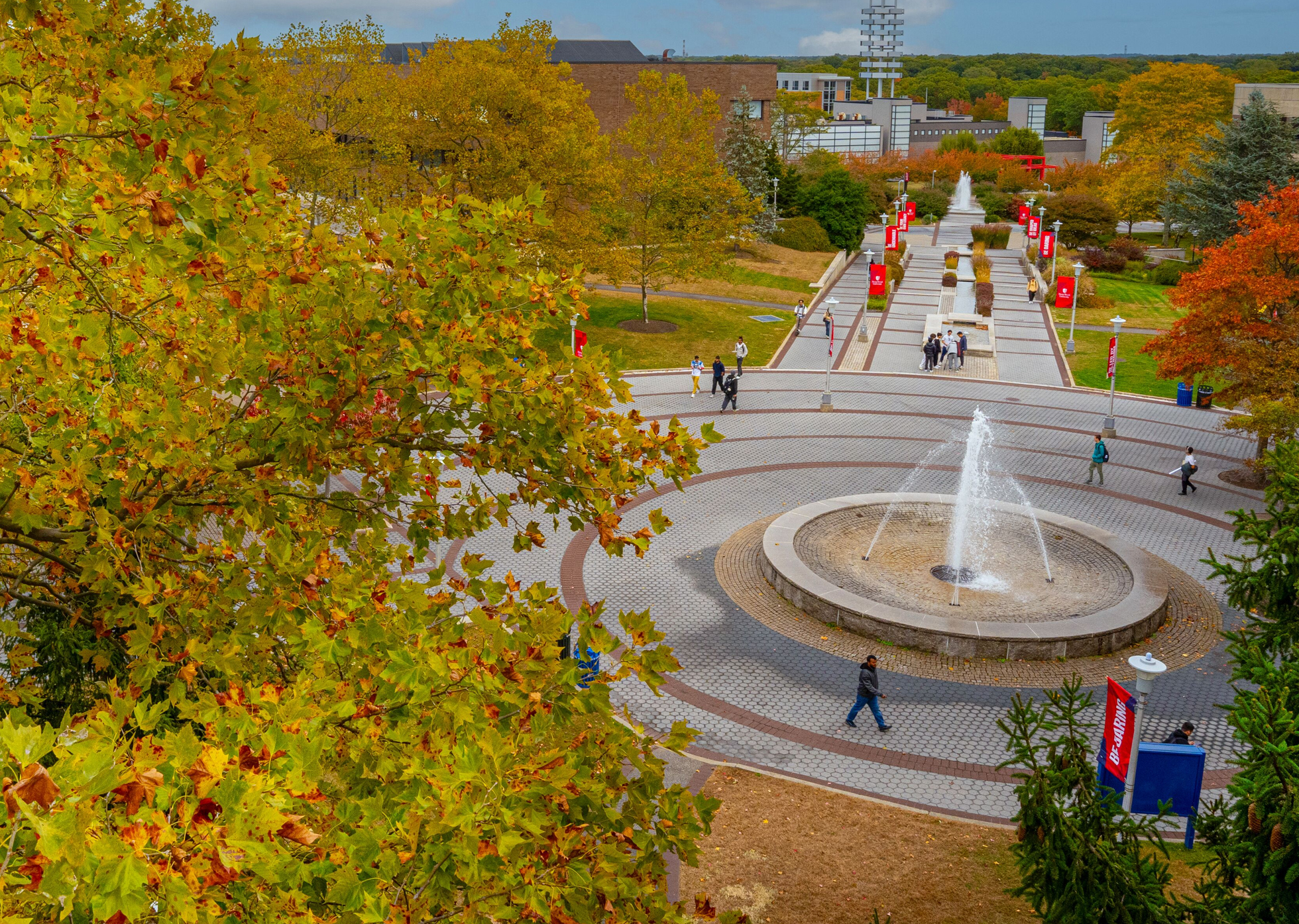 SUNY Stony Brook University College of Business Campus Photo with Fountain in the Horizon