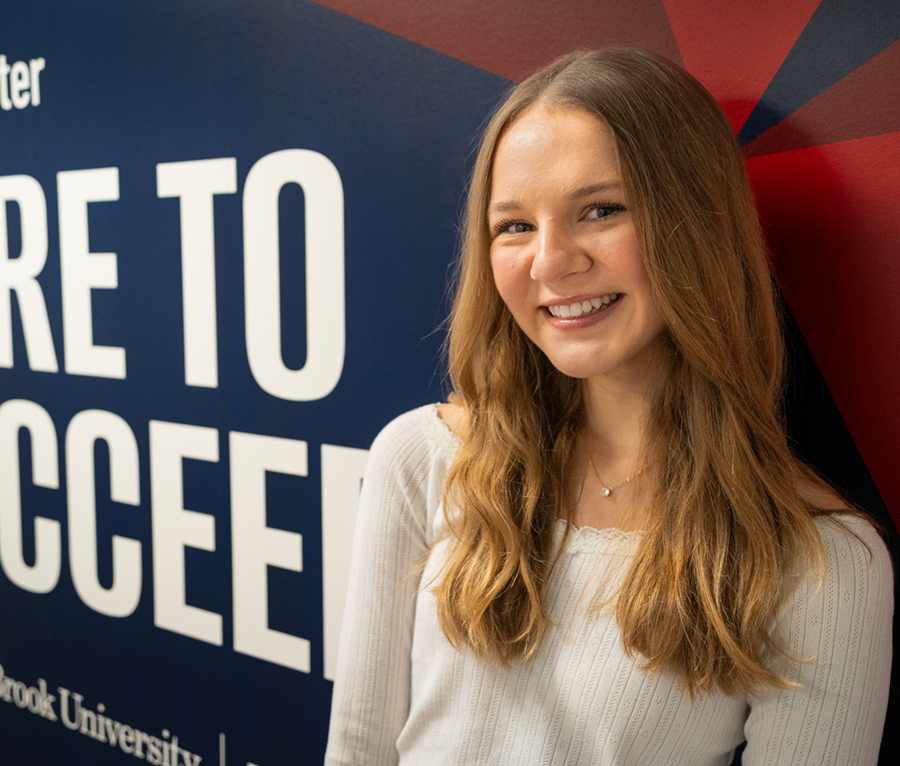 A student intern smiling.