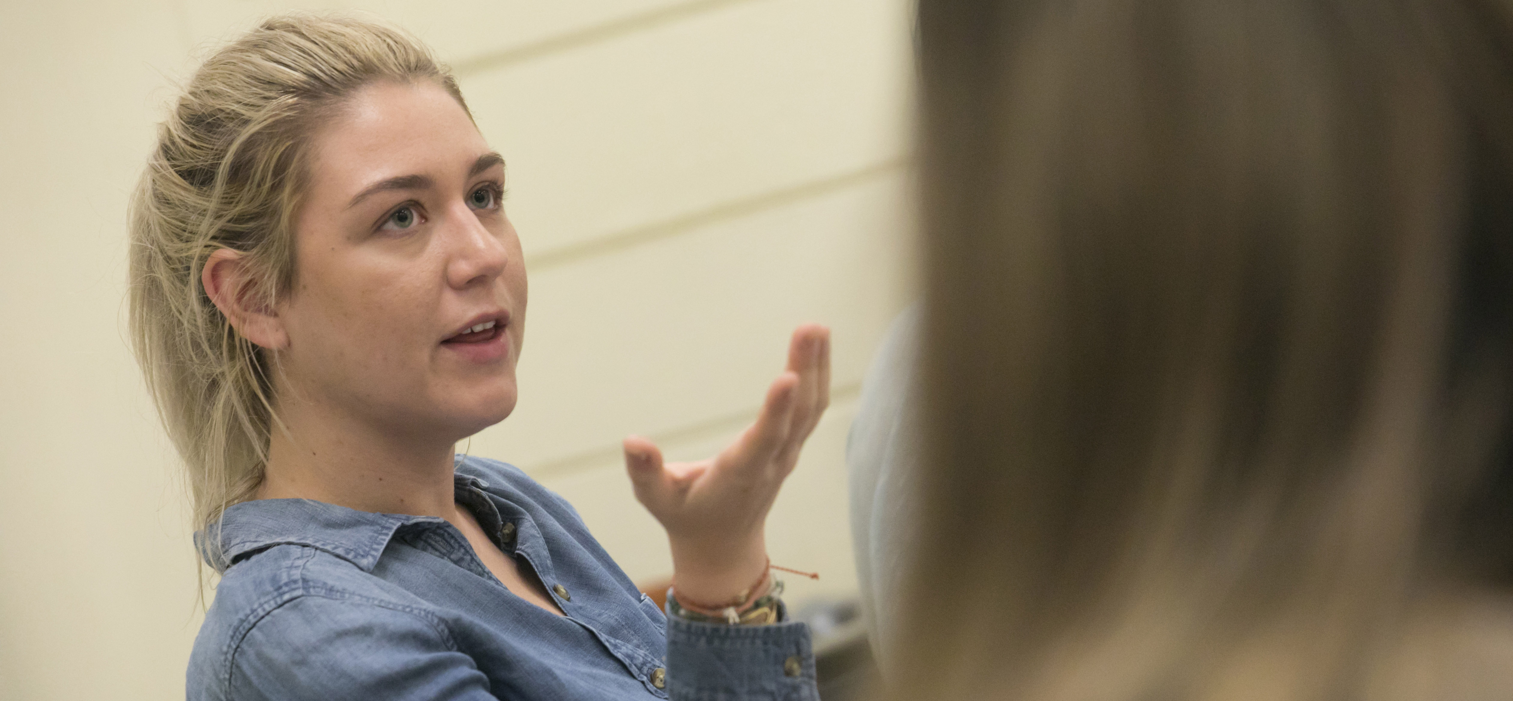 Woman speaking in class