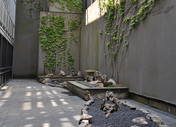 zen rock garden exhibit banner